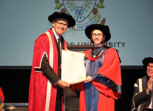 Dr Emma Macdonald being awarded her PhD testamur