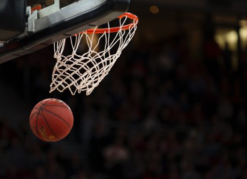 Basketball which has been shot through a net